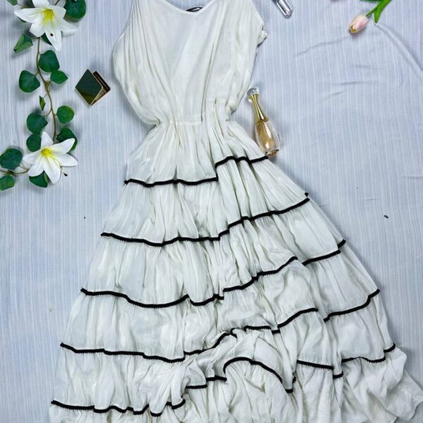 Long cute beach dress with ruffles from splash